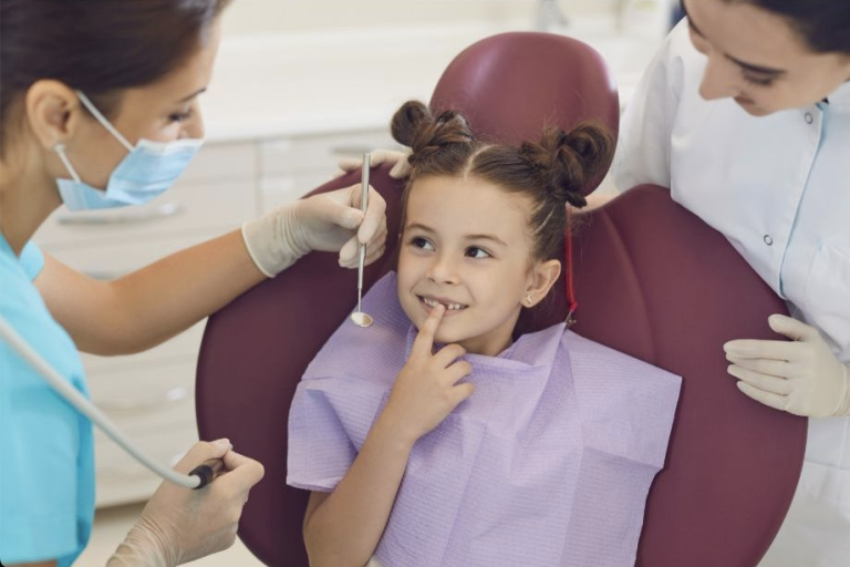little girl for dental exam Art & Science Family Dentistry Woodbury MN